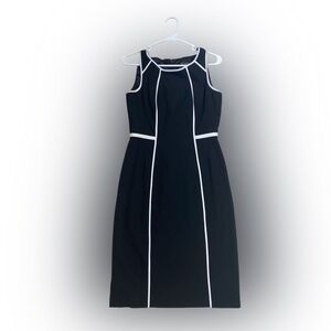 White House black market. Black dress with white piping. Size 2